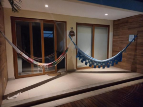 Excelente Village nas piscinas naturais de Itacimirim - 03 quartos - Pertíssimo da praia